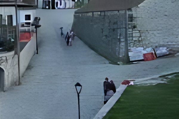 The same photo after AI upscaling, sharp and clear