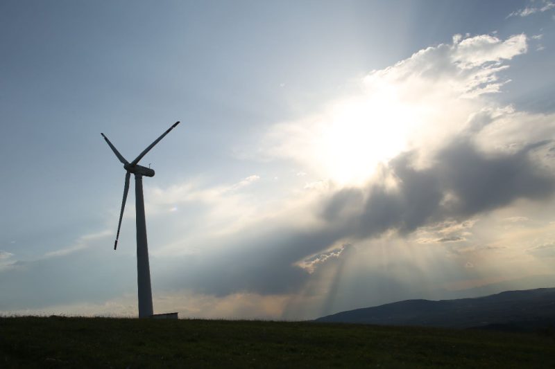 Wind Turbine Against a Sunlit Sky