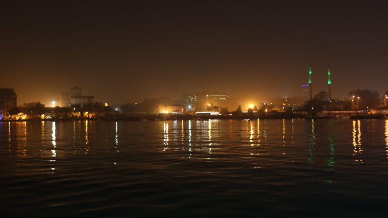 City Lights Reflected on the Water in Istanbul