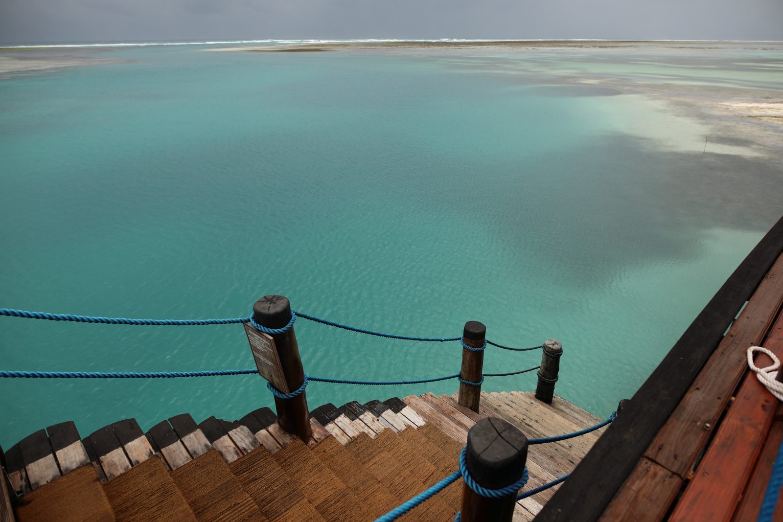 Wooden Steps Down to a Turquoise Lagoon