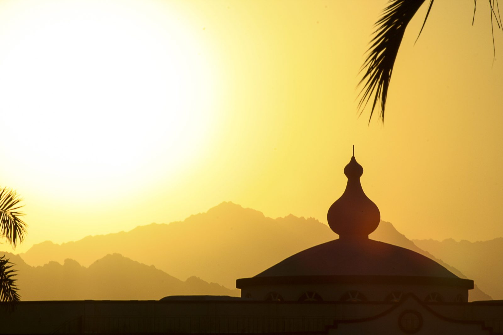 Domed Building Silhouette at a Golden Egyptian Sunset