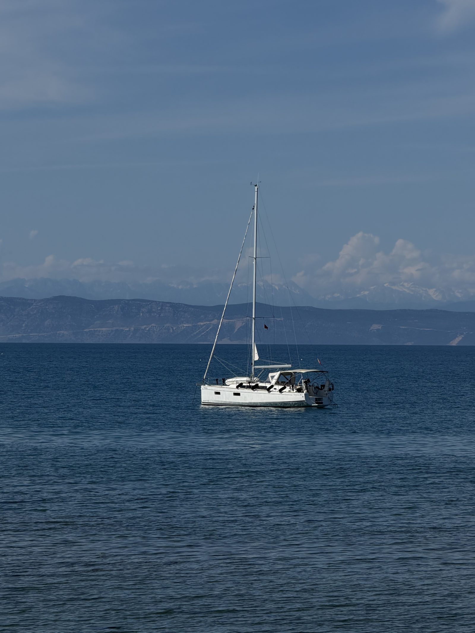 Sailing Catamaran at Anchor on a Calm Sea